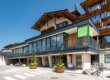 Hôtel Penzinghof au Tyrol, design moderne avec charme traditionnel et vue sur les Alpes.
