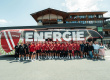 Energie Cottbus team poses in front of the team bus and Hotel Penzinghof